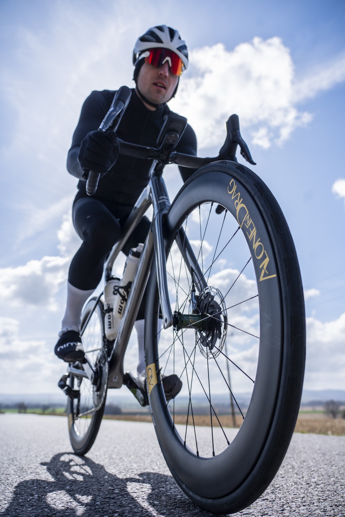 Rider on a road bike fitted with SaBRe VI.V wheels